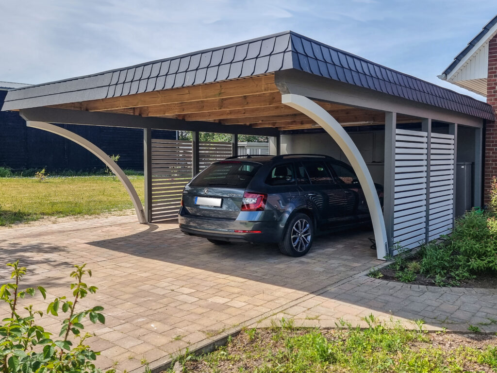 Moderner Rundbogen-Carport in Anthrazit mit Rhombus-Seitenwänden.
